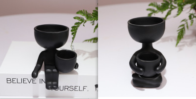 Humanoid ceramic flower pot