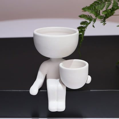 Humanoid ceramic flower pot