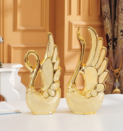 Gold-plated swan ornaments